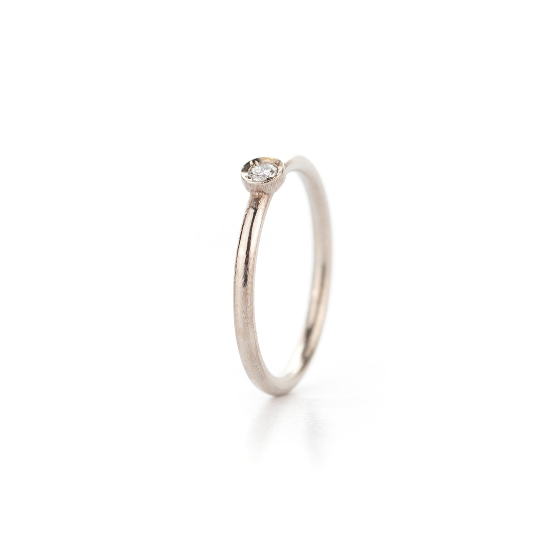 Verlovingsring in witgoud, glanzende afwerking 0.10ct bol
