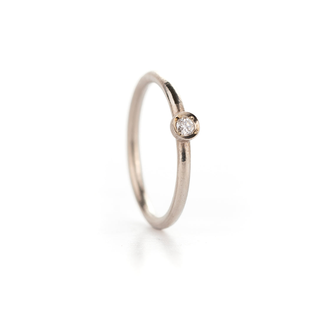 Verlovingsring in witgoud, glanzende afwerking 0.10ct bol